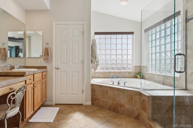 1022 Orion Way, Castle Rock, CO 80108 - full bathroom featuring vanity, a bath, vaulted ceiling, tile patterned floors, and an enclosed shower