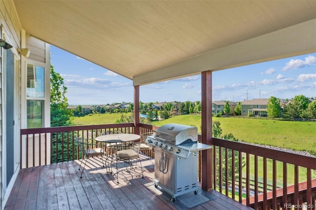 1022 Orion Way, Castle Rock, CO 80108 - deck featuring grilling area, outdoor dining area, and a yard