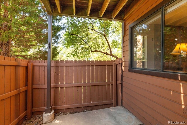 view of gate with fence