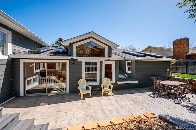 back of house with a patio area