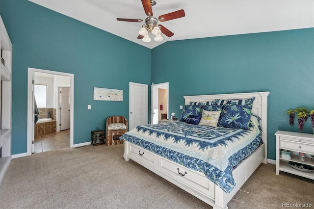 carpeted bedroom featuring ensuite bathroom and ceiling fan