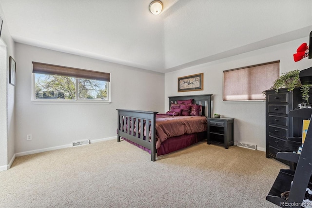 bedroom featuring light colored carpet