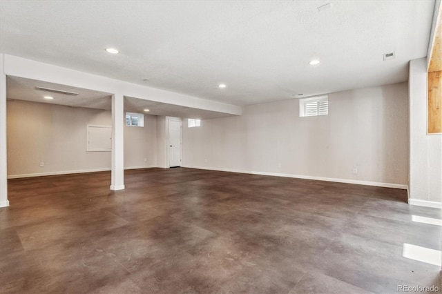 basement with a textured ceiling