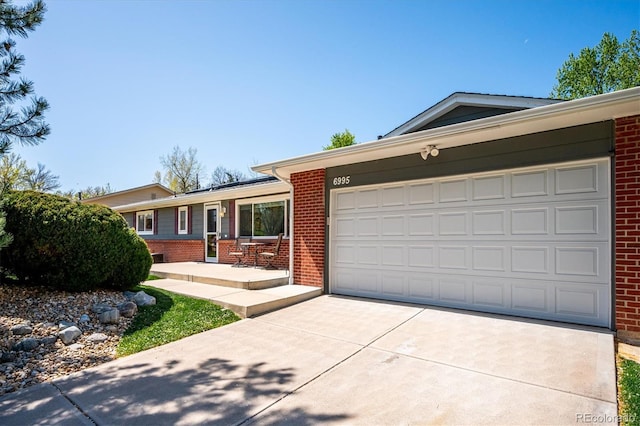 single story home with a garage