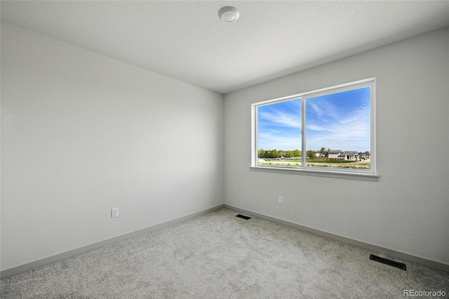 260 E 4th St, Berthoud, CO 80513 - carpeted empty room featuring baseboards