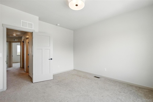 260 E 4th St, Berthoud, CO 80513 - empty room featuring light colored carpet and baseboards