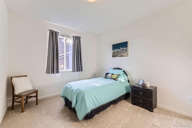 8915 S Field Ct, Littleton, CO 80128 - carpeted bedroom featuring baseboards