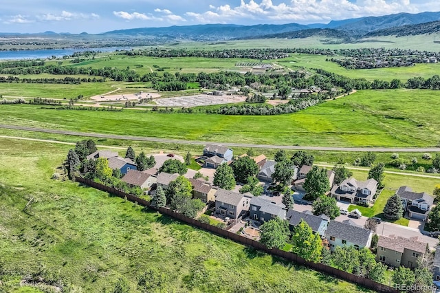 8915 S Field Ct, Littleton, CO 80128 - drone / aerial view of a water and mountain view