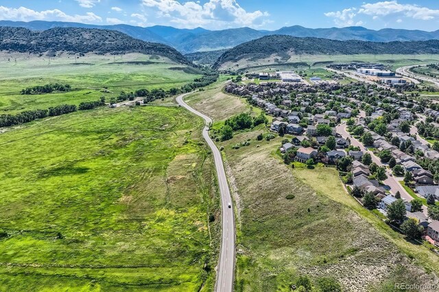 8915 S Field Ct, Littleton, CO 80128 - aerial view of residential area featuring mountains