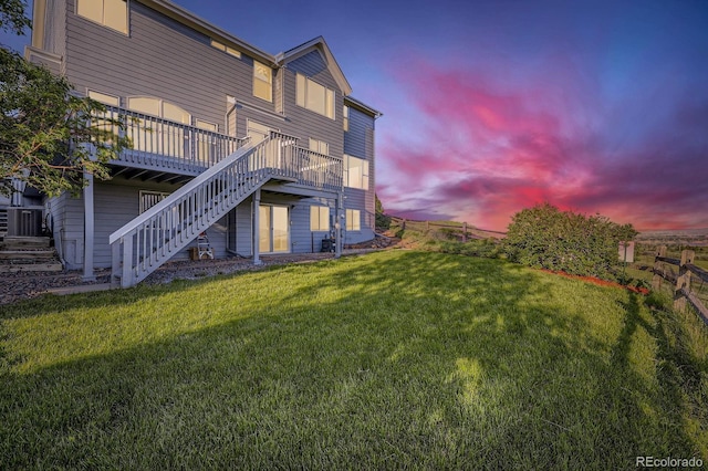 8915 S Field Ct, Littleton, CO 80128 - back of property featuring stairs and a deck
