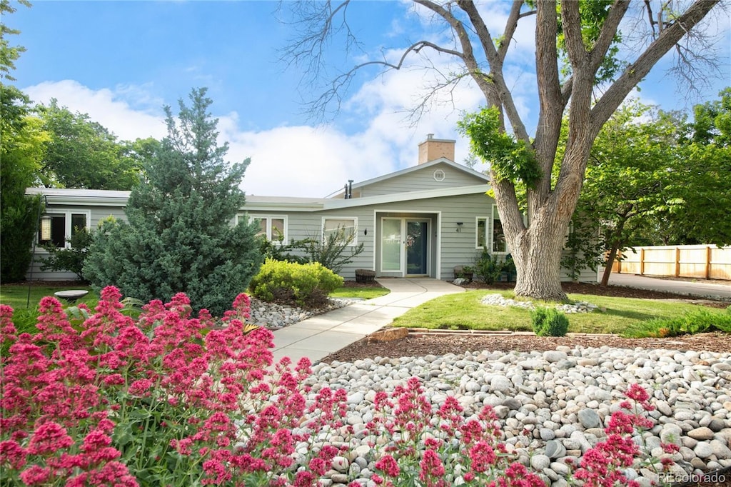 41 Skyline Dr, Wheat Ridge, CO 80215 - view of front facade featuring a chimney