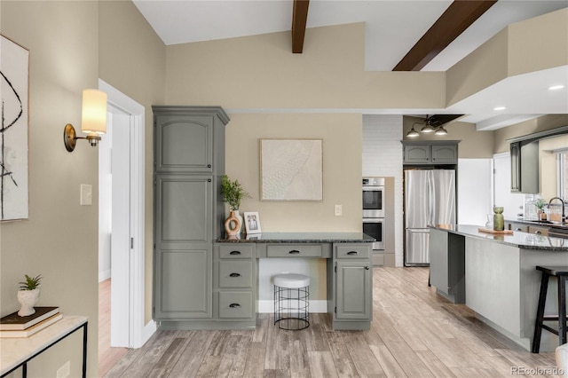 41 Skyline Dr, Wheat Ridge, CO 80215 - kitchen with appliances with stainless steel finishes, gray cabinets, light wood finished floors, and built in study area