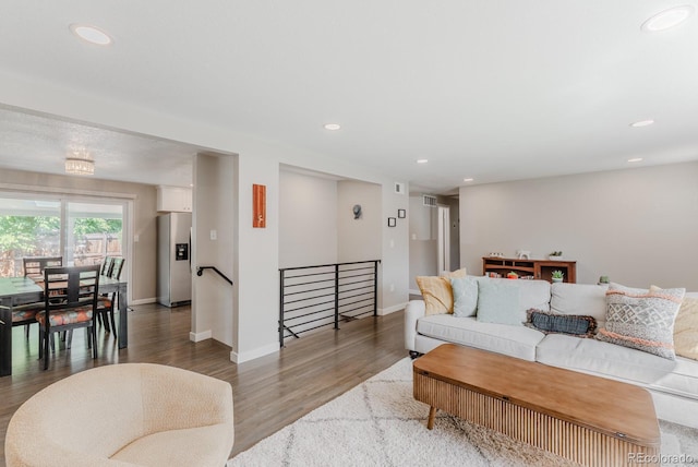 6059 Routt St, Arvada, CO 80004 - living room with wood finished floors and recessed lighting