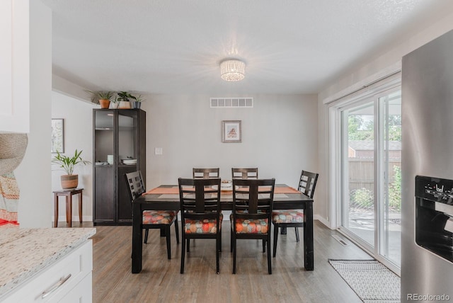 6059 Routt St, Arvada, CO 80004 - dining space featuring light wood-style flooring