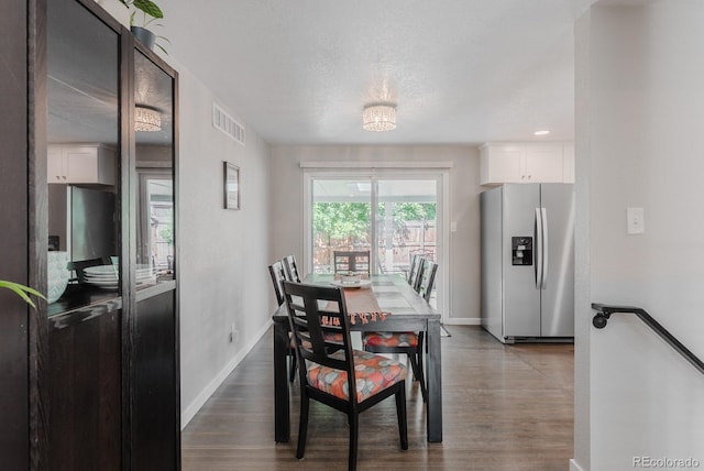 6059 Routt St, Arvada, CO 80004 - dining room featuring dark wood-style flooring