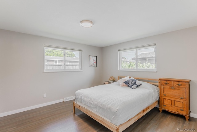 6059 Routt St, Arvada, CO 80004 - bedroom featuring wood finished floors and baseboards