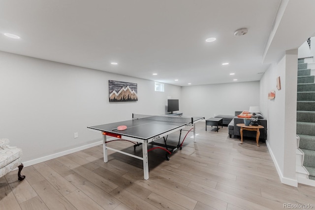 6059 Routt St, Arvada, CO 80004 - rec room with light wood finished floors and recessed lighting