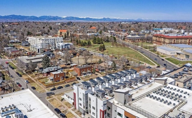 birds eye view of property with a mountain view