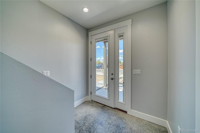 doorway to outside featuring plenty of natural light