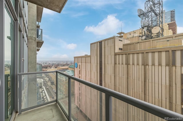 balcony featuring a city view