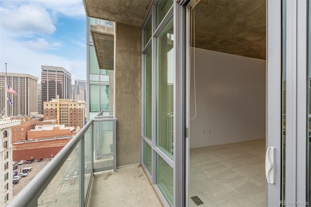 balcony featuring a view of city