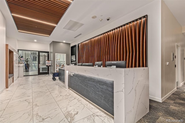 reception area with a surveillance system and recessed lighting