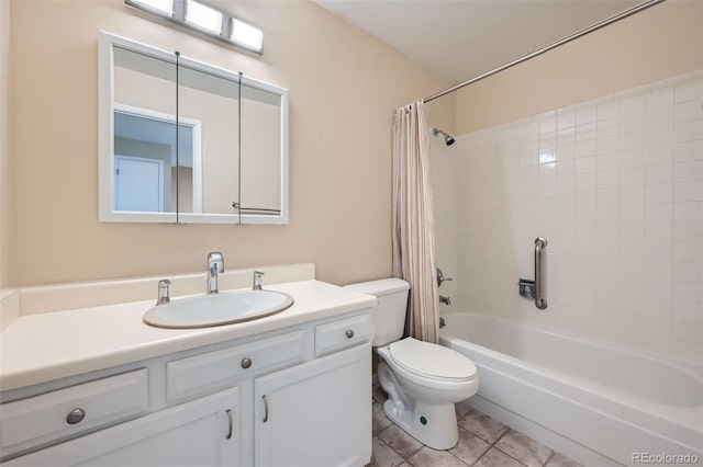 full bathroom featuring tile patterned flooring, shower / bath combination with curtain, toilet, and vanity