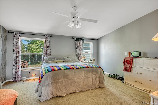 bedroom featuring ceiling fan and carpet flooring