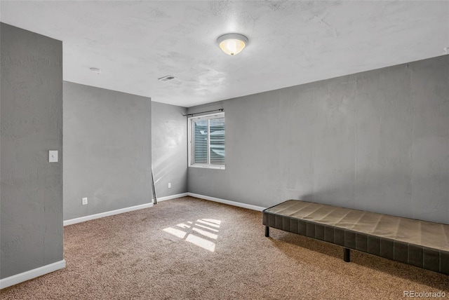 unfurnished bedroom with carpet