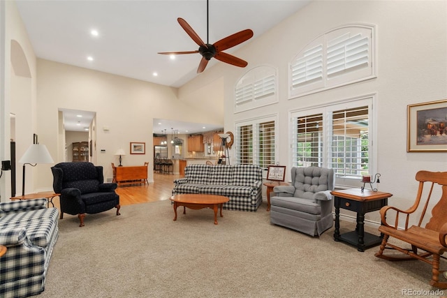 3806 S Dawson St, Aurora, CO 80014 - living area with ceiling fan, high vaulted ceiling, light colored carpet, and recessed lighting