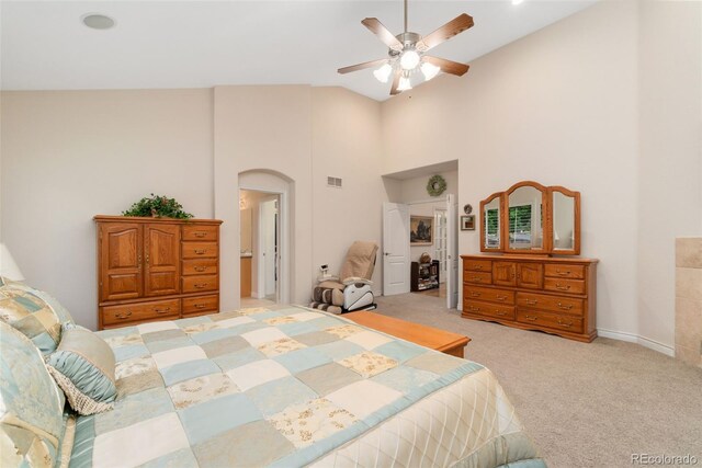 3806 S Dawson St, Aurora, CO 80014 - bedroom with arched walkways, light carpet, a high ceiling, and a ceiling fan