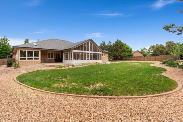 3806 S Dawson St, Aurora, CO 80014 - back of house with a sunroom and a patio