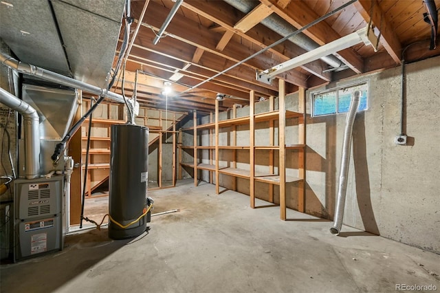 6432 Zephyr St, Arvada, CO 80004 - below grade area featuring water heater and heating unit