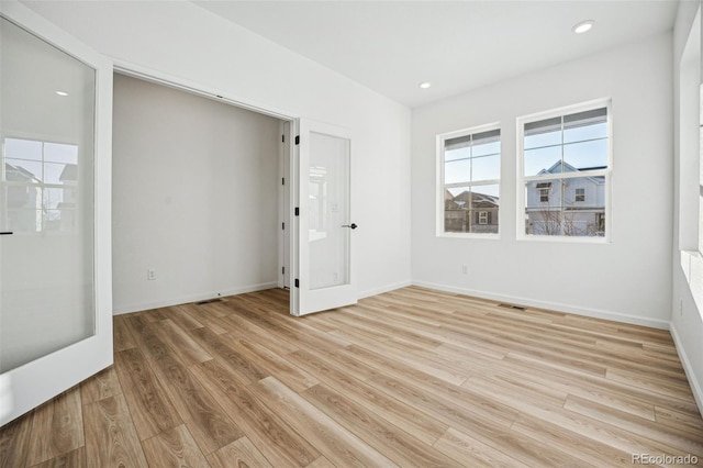 empty room featuring light hardwood / wood-style flooring