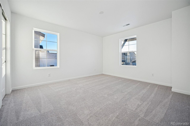 view of carpeted spare room