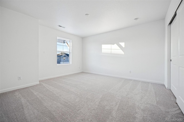 empty room with light carpet