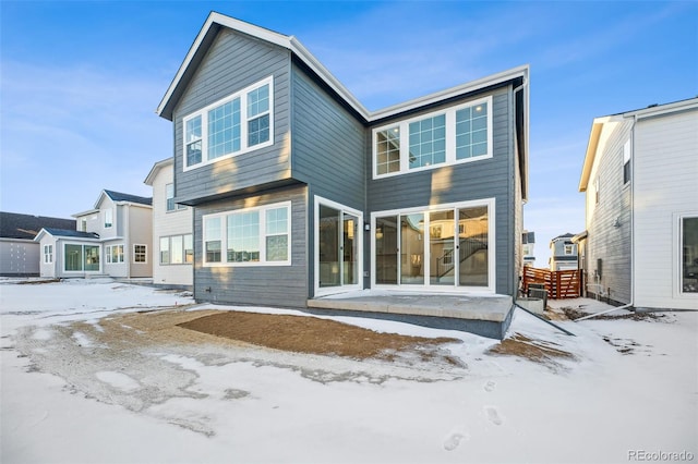 view of snow covered property