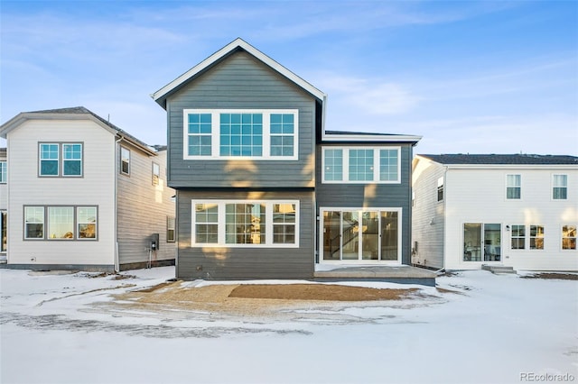 view of snow covered property