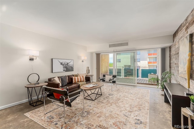 1121 Albion St Unit 809, Denver, CO 80220 - living room featuring concrete floors