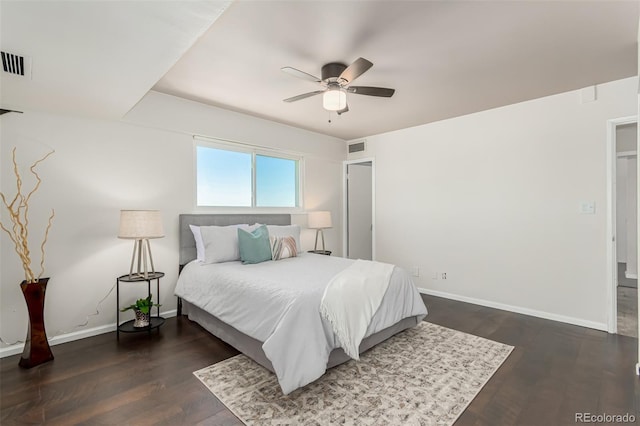 1121 Albion St Unit 809, Denver, CO 80220 - bedroom featuring baseboards, wood finished floors, and ceiling fan