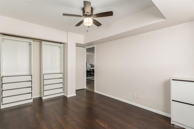 1121 Albion St Unit 809, Denver, CO 80220 - unfurnished bedroom featuring baseboards, wood finished floors, a closet, and a ceiling fan