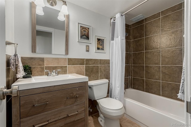 1121 Albion St Unit 809, Denver, CO 80220 - full bath with tile walls, vanity, toilet, shower / bath combo, and tile patterned floors
