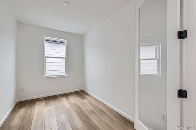 unfurnished room featuring light hardwood / wood-style flooring