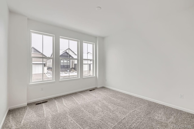 view of carpeted spare room