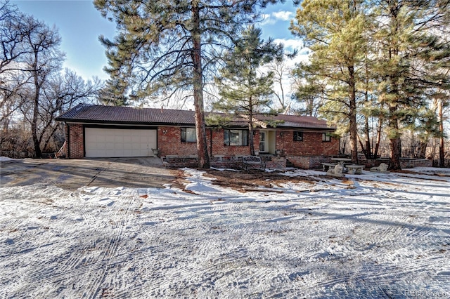 single story home with a garage