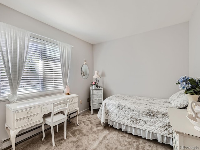 carpeted bedroom featuring a baseboard heating unit