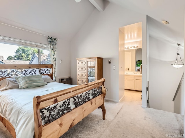 carpeted bedroom with beam ceiling, connected bathroom, and high vaulted ceiling