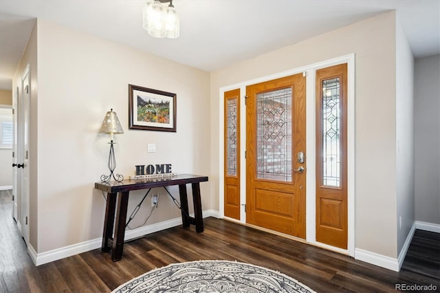 entrance foyer featuring dark hardwood / wood-style flooring