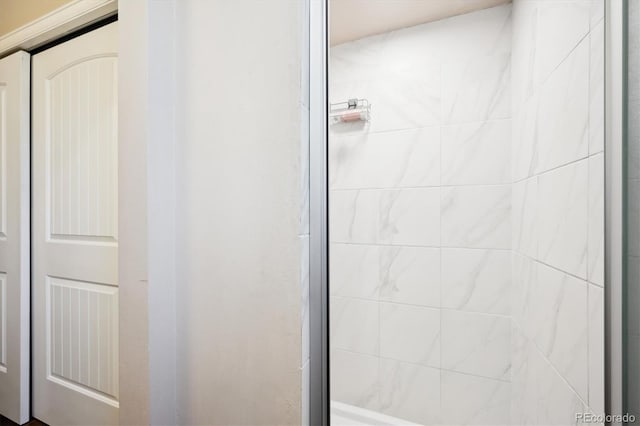 bathroom featuring an enclosed shower