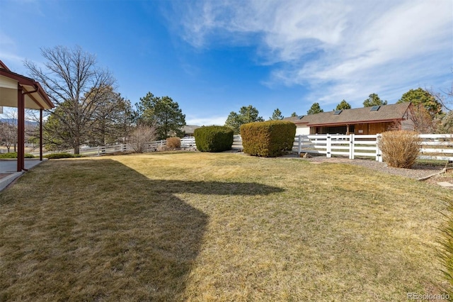view of yard with fence